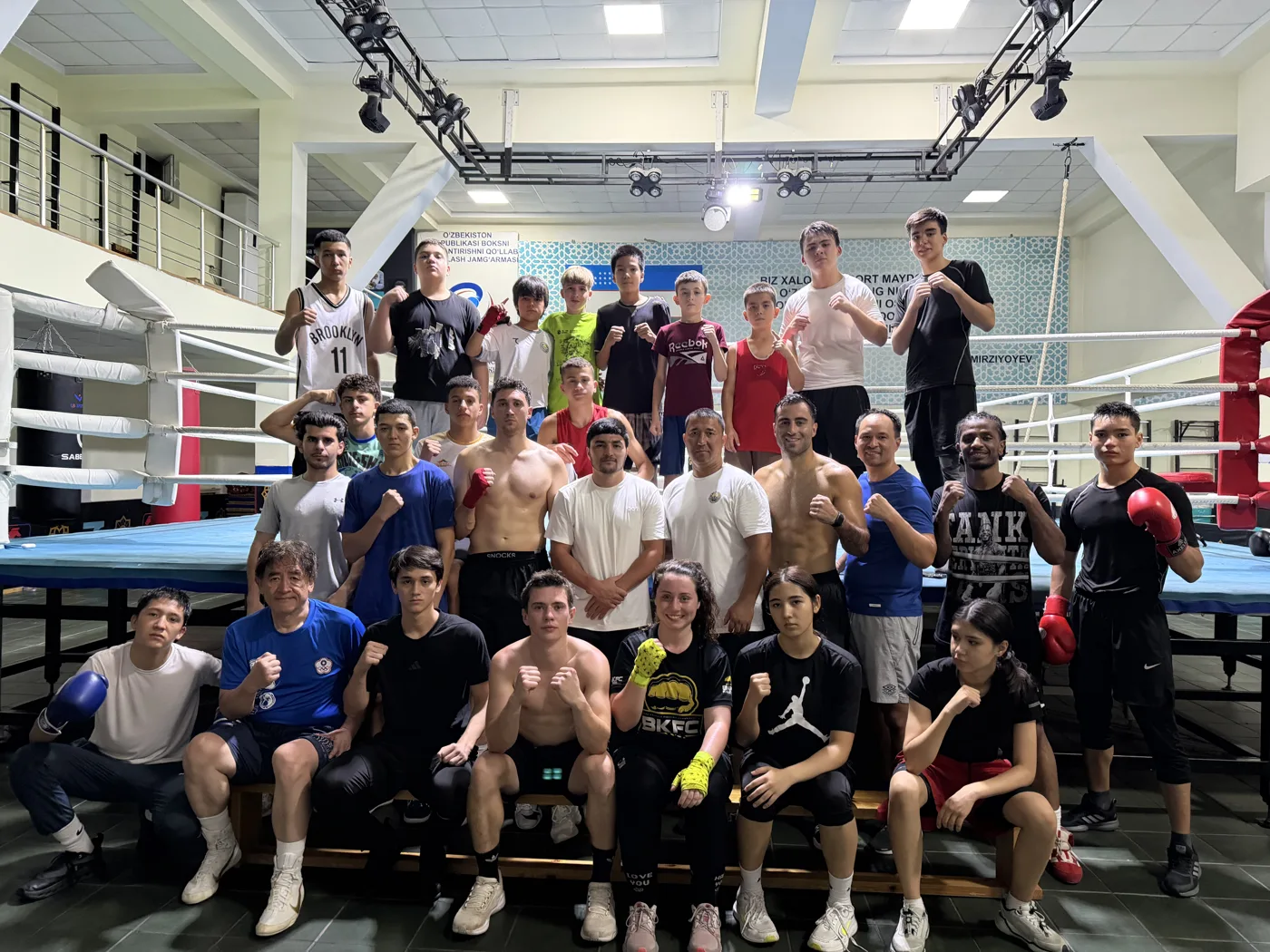 Group photo of the camp athletes in the boxing gym