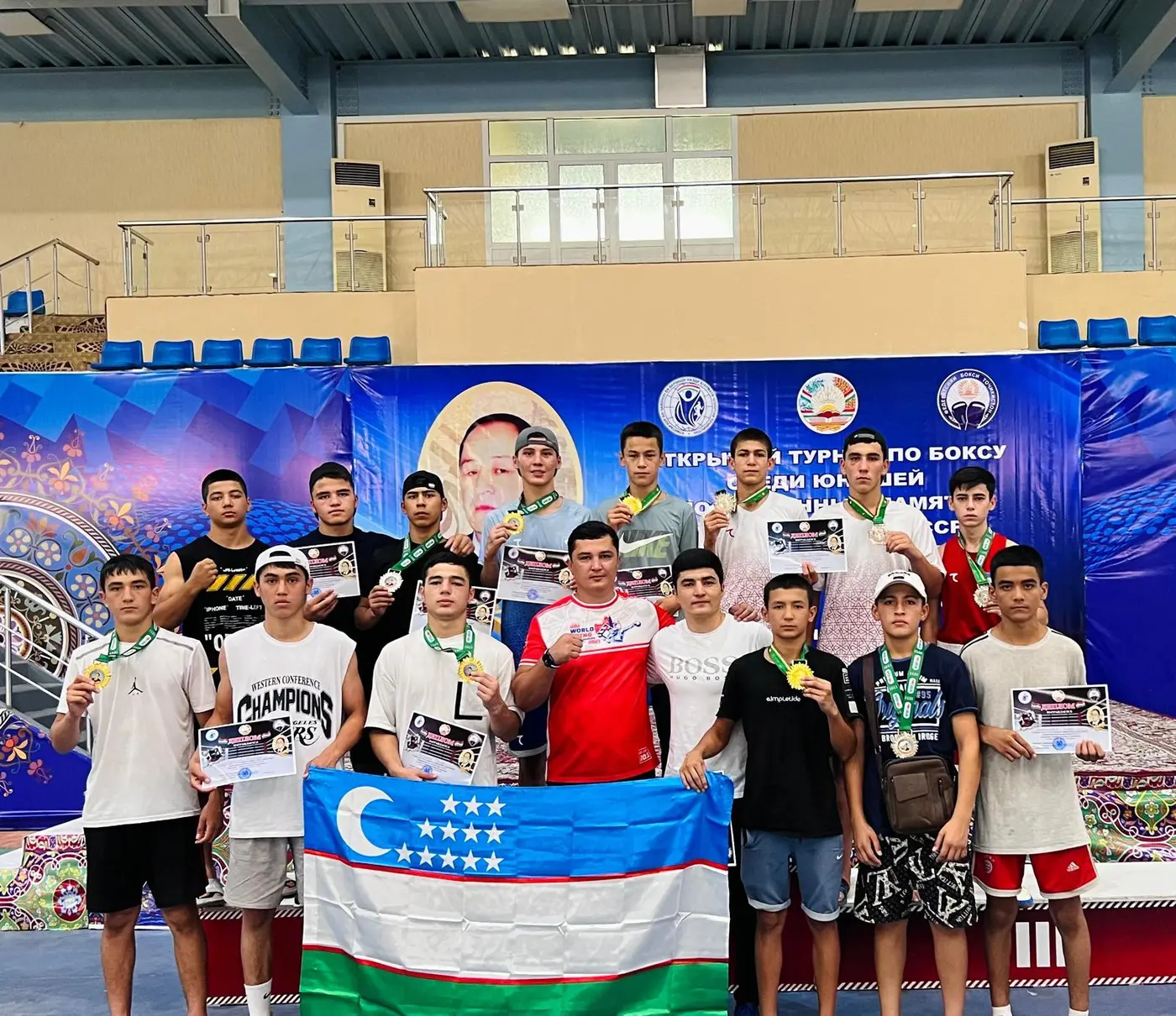 Medalists with Uzbek flag